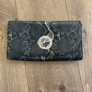 Snakeskin print clutch